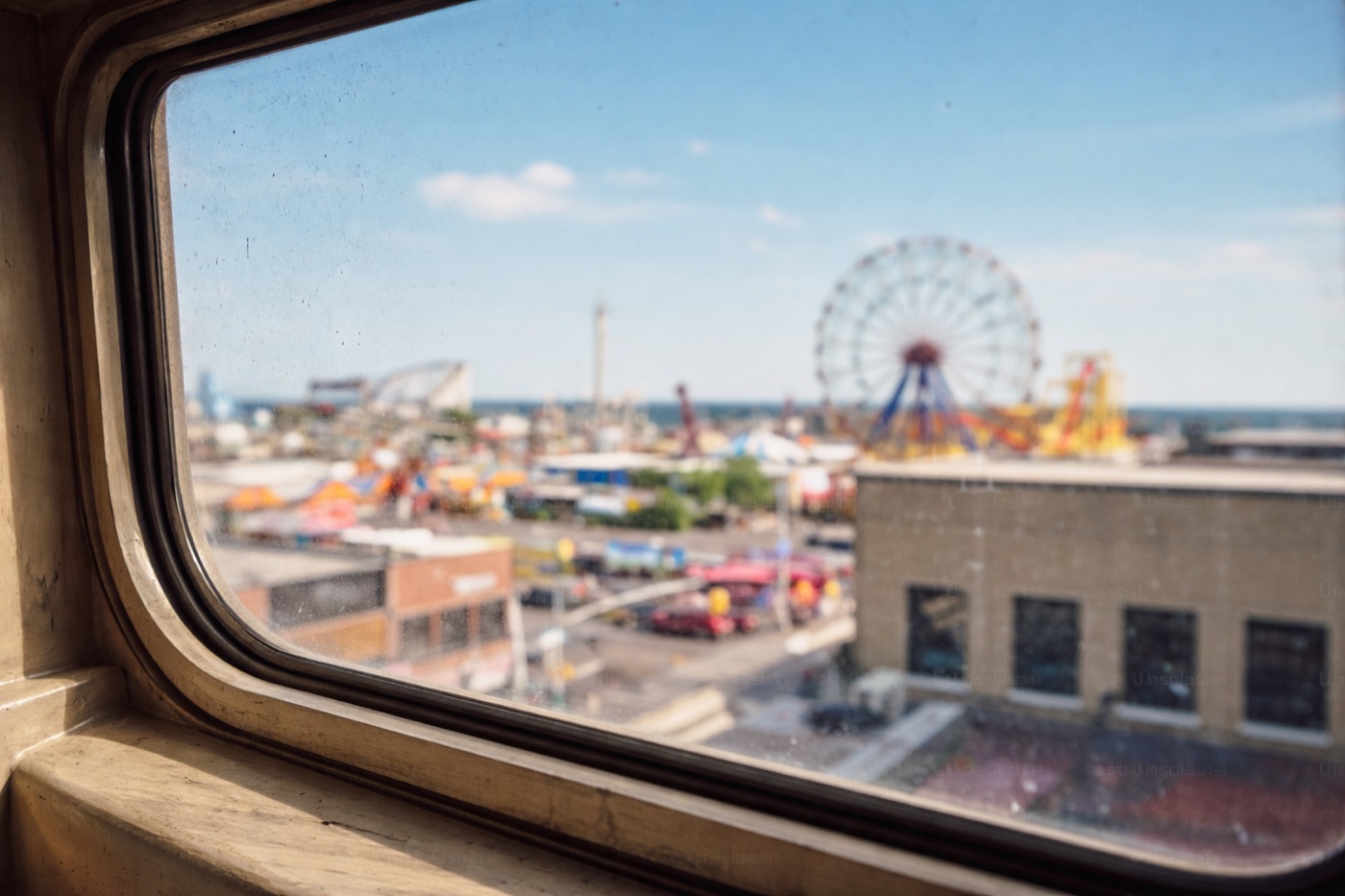 View of an event precinct through a train window on the way in.